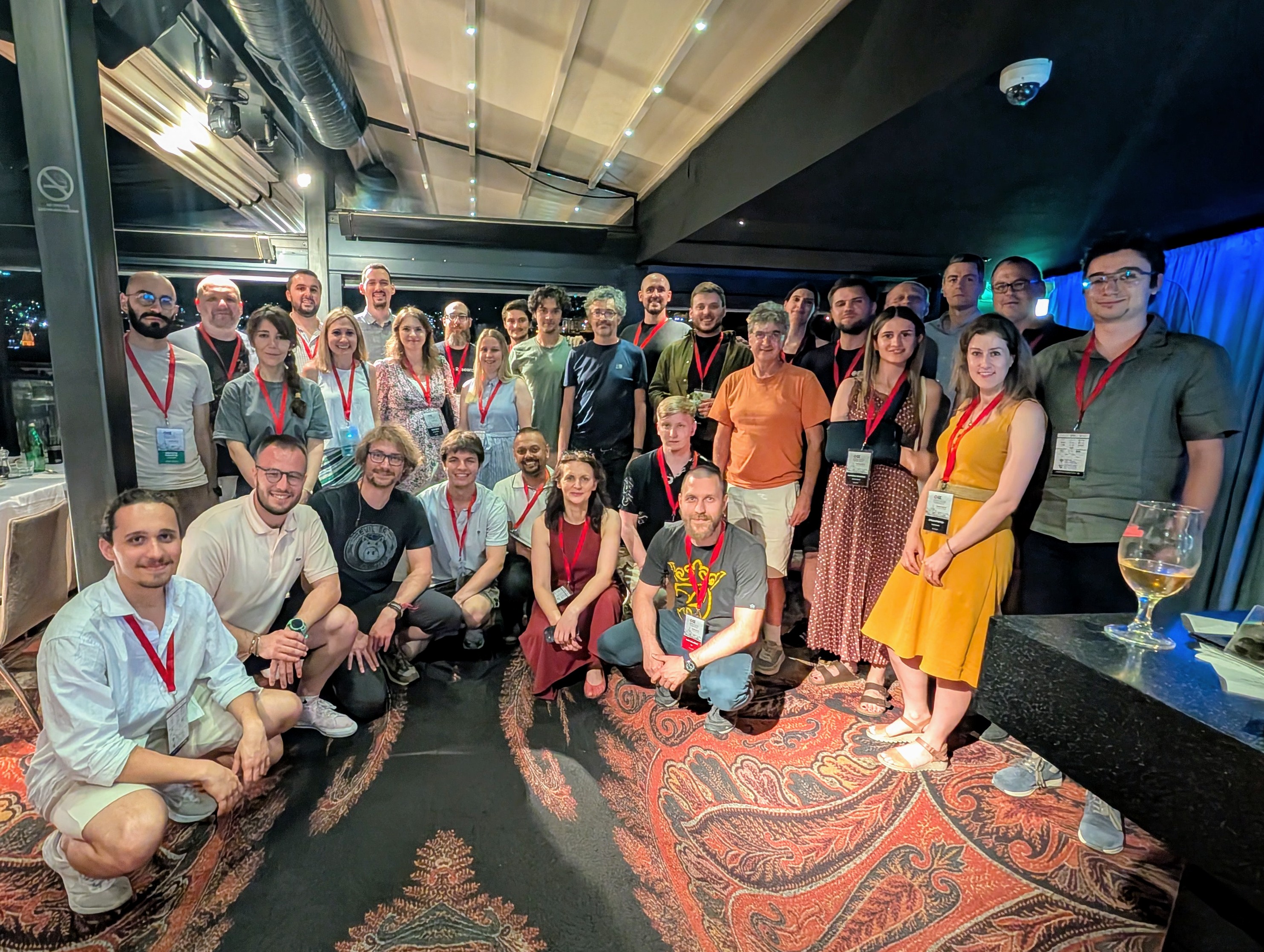 The speakers, organizers, and TAs enjoying a quiet dinner together.