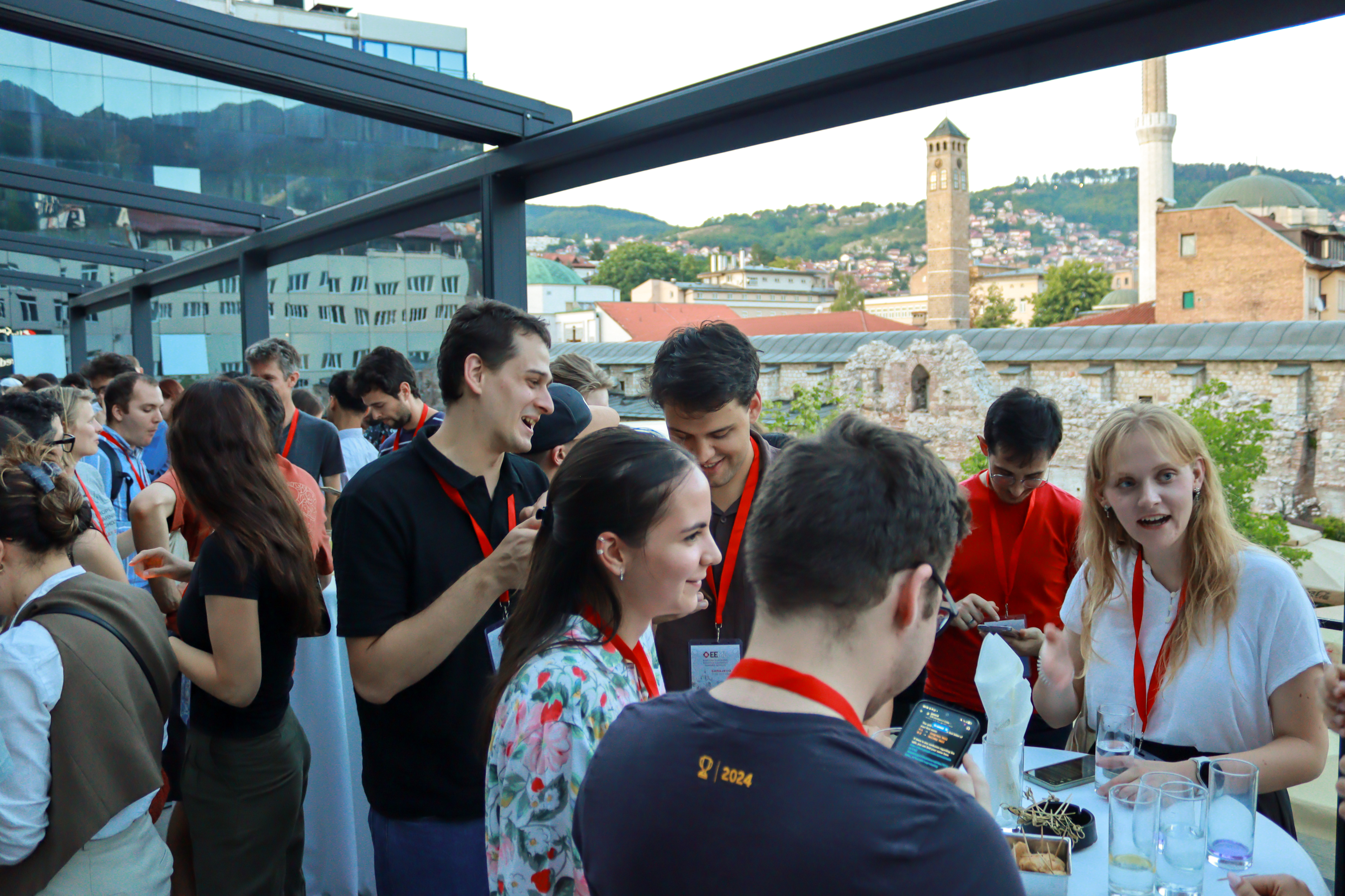 Attendees mingling and networking during the welcome drinks reception.